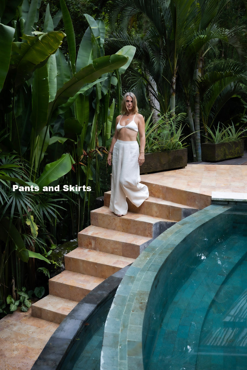 A-Woman-wearing-in-a-lush-garden-Shivani-Divine-Wear-PRABHA Tea-Dye-Elegant-Silk-Romper