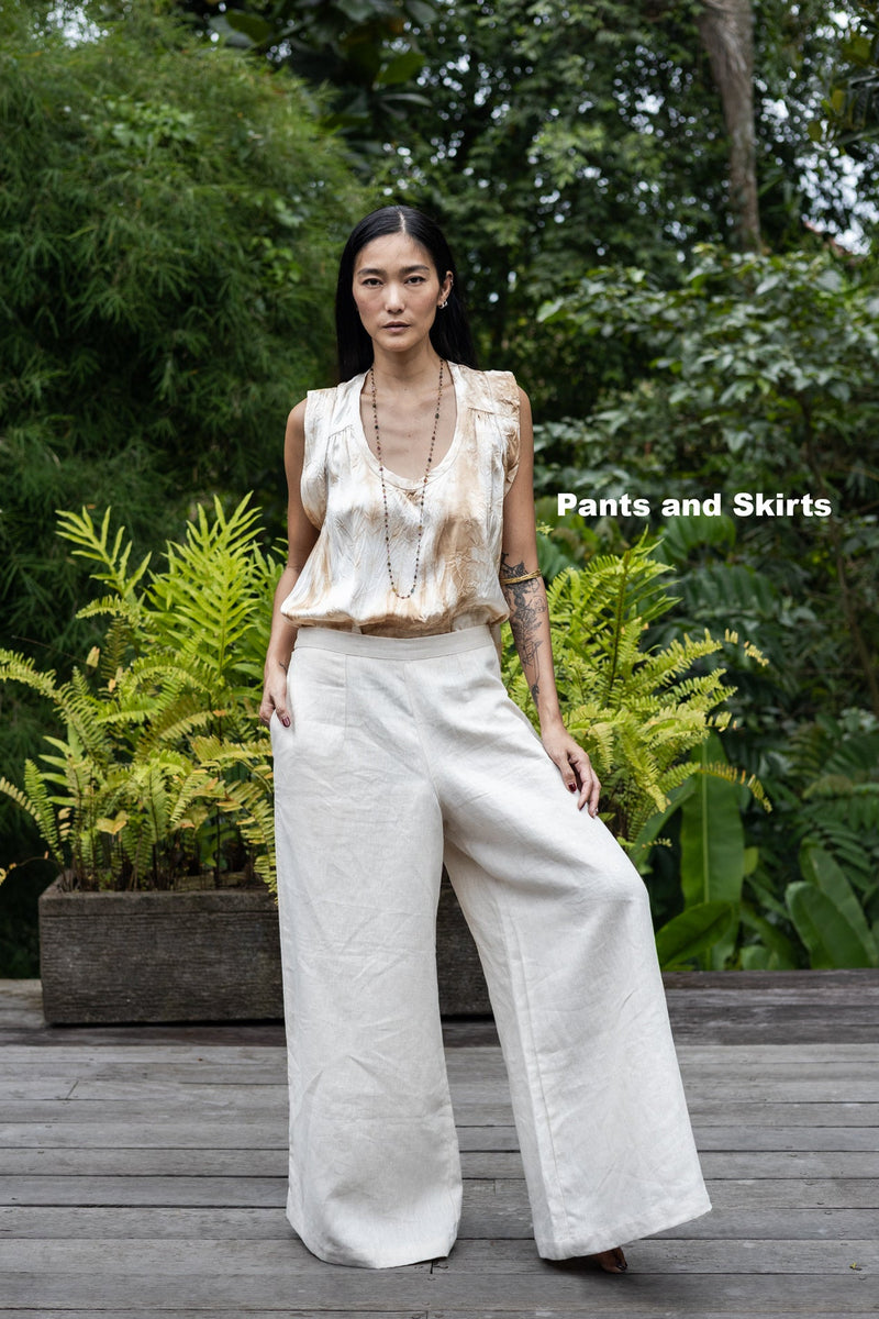 A-Woman-wearing-in-a-lush-garden-Shivani-Divine-Wear-PRABHA Tea-Dye-Elegant-Silk-Romper